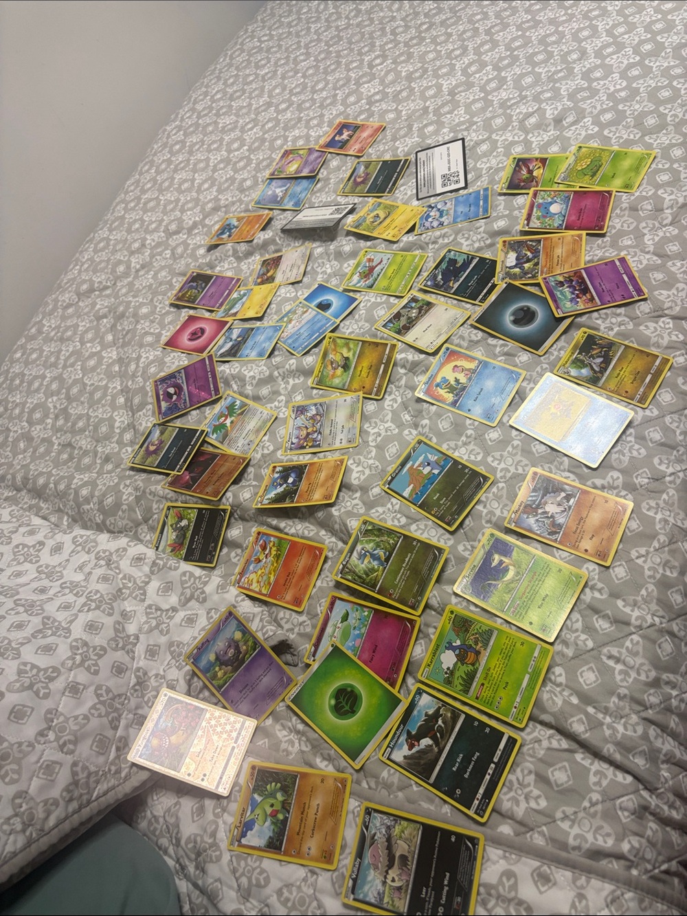Pokemon Assorted Trading Cards with Yellow, Green, Blue, Purple Accents